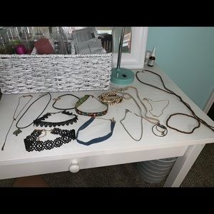 12 necklaces and one set of bracelets